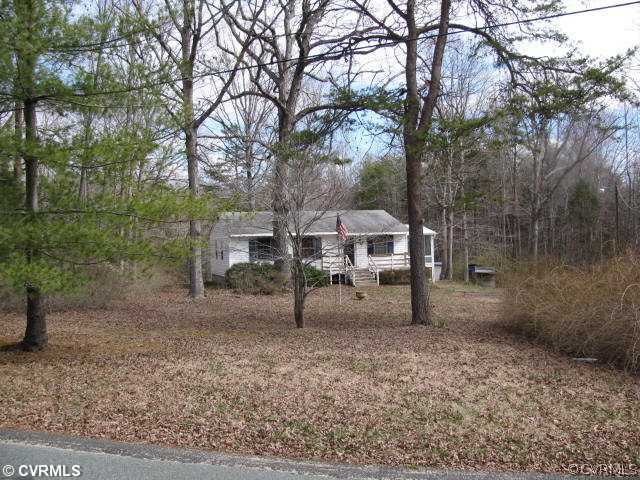 2390 Sheppard Town Road Maidens, VA 23102 - Photo 7 of 12 a view of a house with a yard
