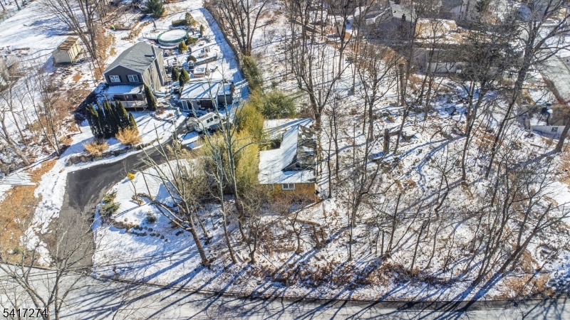 104 Espanong Road Lake Hopatcong, NJ 07849 - Photo 8 of 18 a backyard of a house