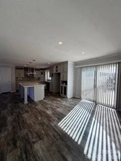 a bed room with a bed and cabinets