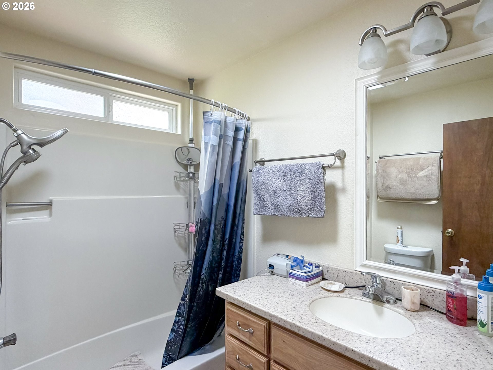 1372 Hampton Road Brookings, OR 97415 - Photo 20 of 42 a bathroom with a sink vanity granite and toilet