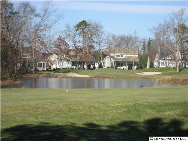 23 Shoal Road Jackson, NJ 08527 - Photo 17 of 21 a view of a lake with houses