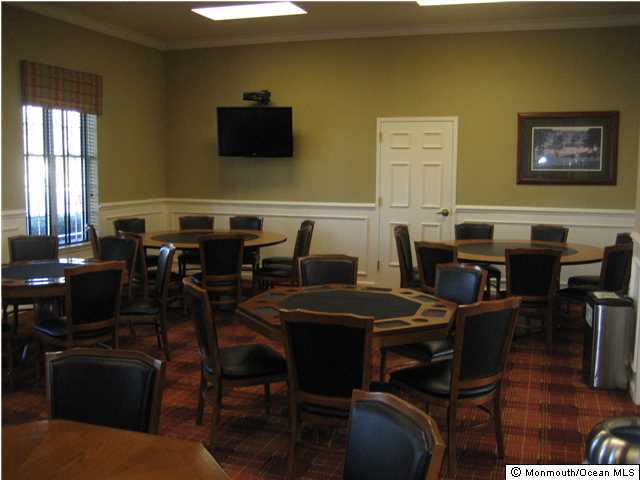 23 Shoal Road Jackson, NJ 08527 - Photo 20 of 21 a view of a dining room with furniture and wooden floor