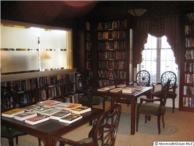23 Shoal Road Jackson, NJ 08527 - Photo 21 of 21 a view of a dining table and chairs in the patio