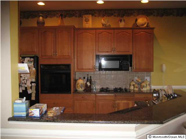 23 Shoal Road Jackson, NJ 08527 - Photo 10 of 21 a room with wooden floor