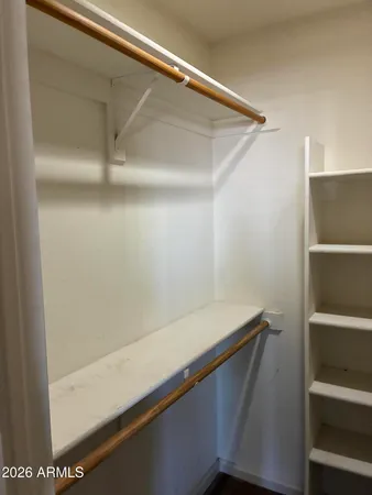 a close view of a sink a microwave a stove and cabinets in the kitchen