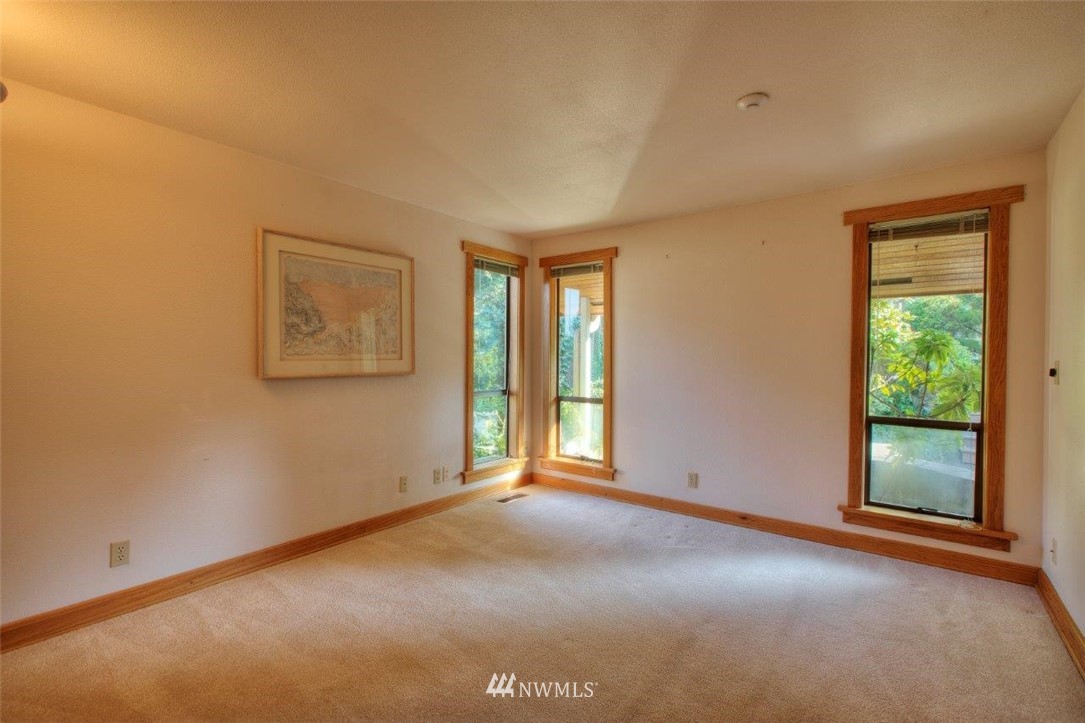 1822 Channel Road East Lake Tapps, WA 98391 - Photo 24 of 38 an empty room with windows