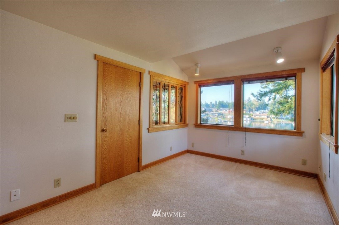 1822 Channel Road East Lake Tapps, WA 98391 - Photo 25 of 38 an empty room with windows