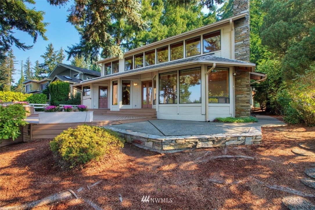 1822 Channel Road East Lake Tapps, WA 98391 - Photo 29 of 38 a front view of a house with garden