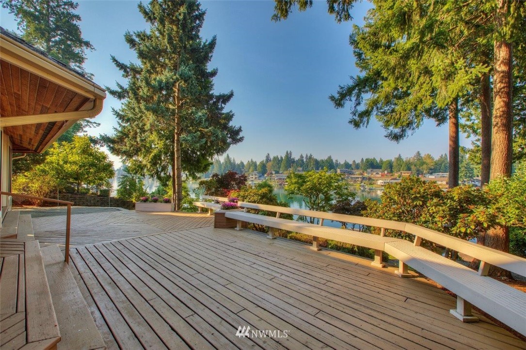 1822 Channel Road East Lake Tapps, WA 98391 - Photo 30 of 38 a view of a balcony with wooden floor and fence