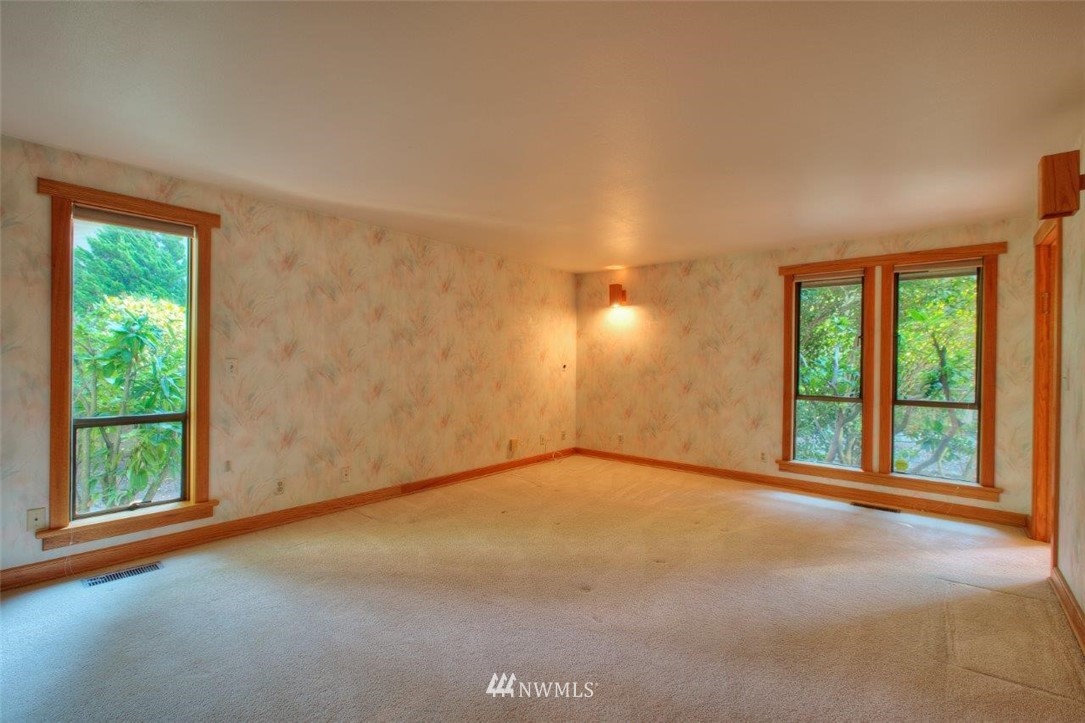 1822 Channel Road East Lake Tapps, WA 98391 - Photo 9 of 38 a view of a room with a large window
