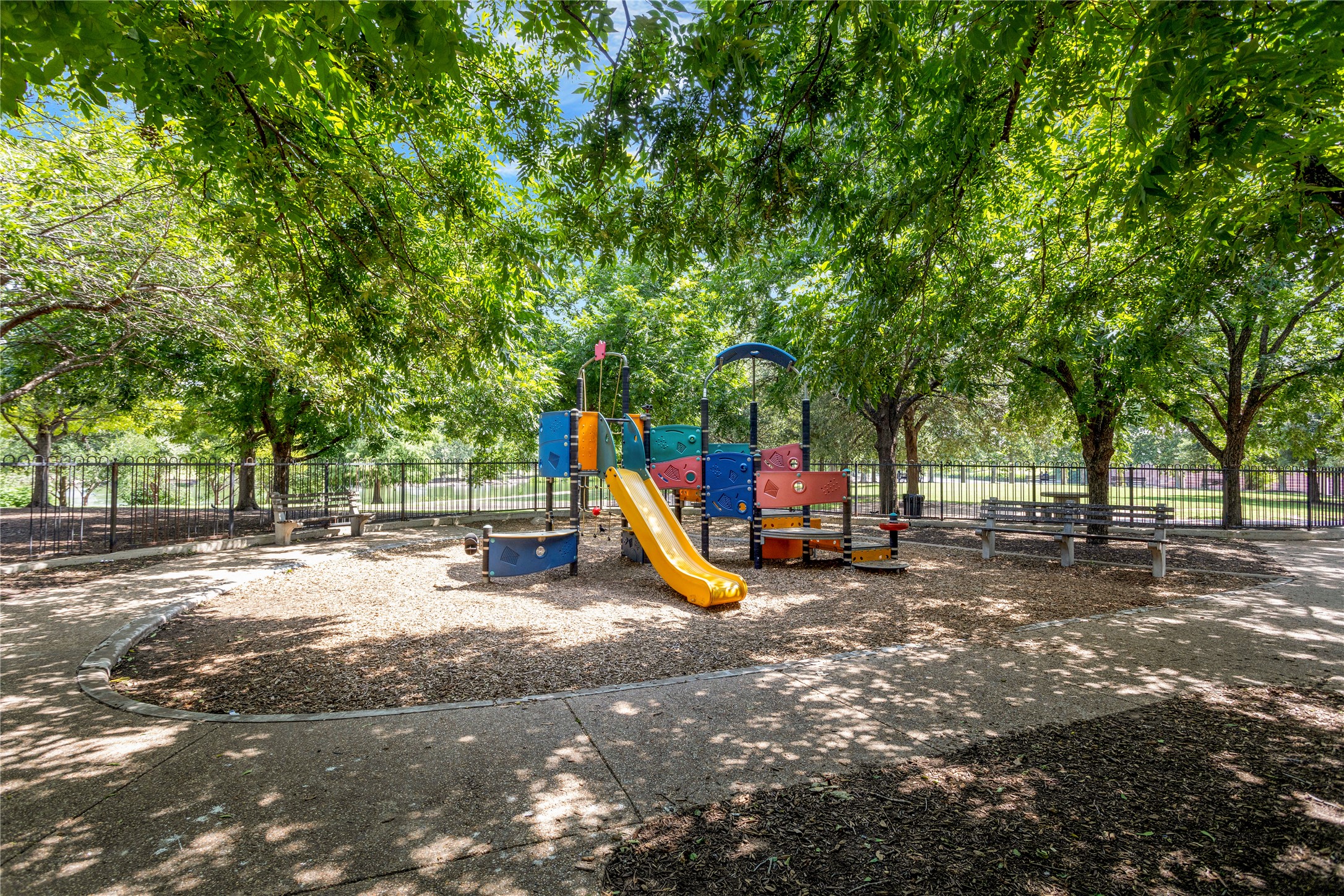 2805 McCurdy Street, Unit 14 Austin, TX 78723 - Photo 31 of 40 A well-shaded playground offers a vibrant activity structure for endless fun.