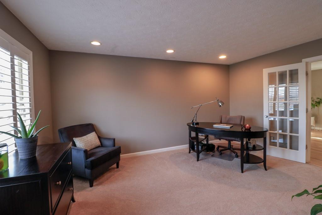 549 Dorchester Drive Seven Fields, PA 16046 - Photo 14 of 35 a view of a workspace with furniture and a window