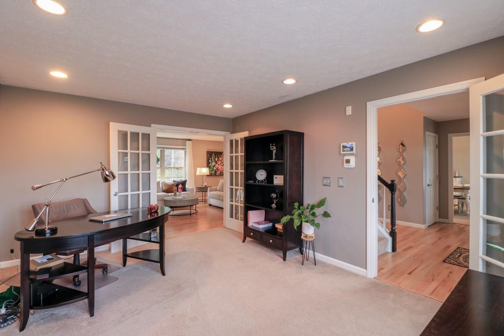 549 Dorchester Drive Seven Fields, PA 16046 - Photo 15 of 35 a living room with furniture and a wooden floor