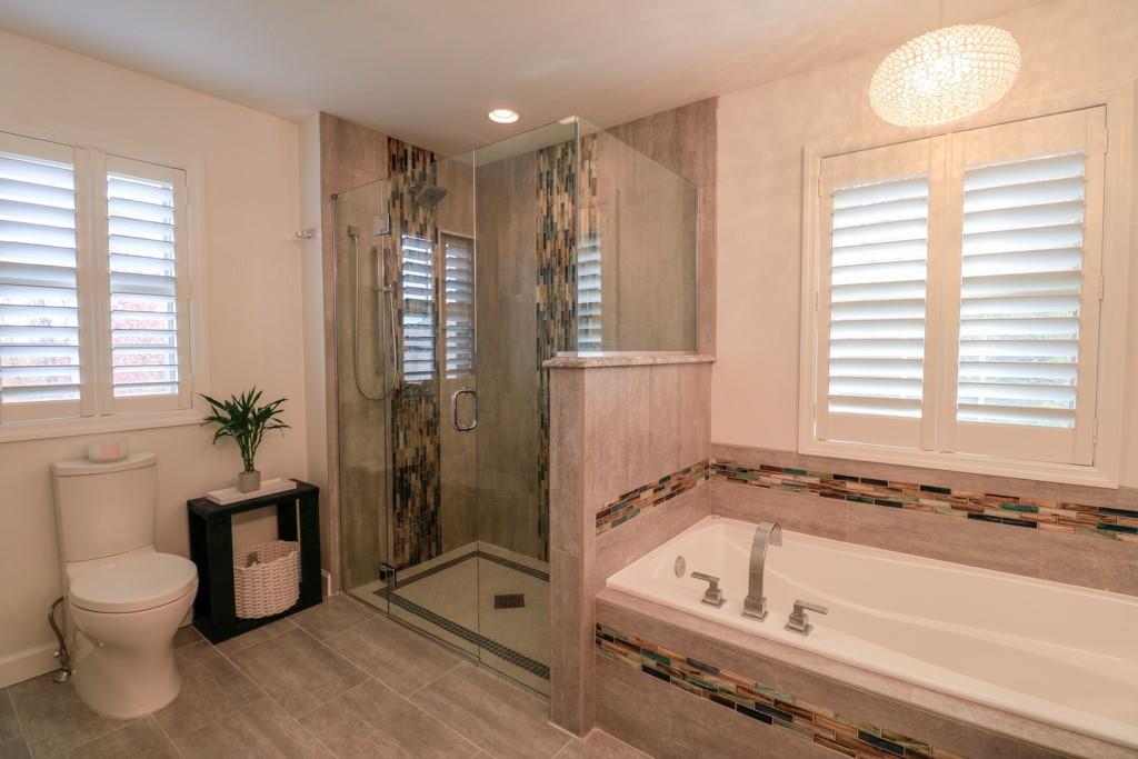549 Dorchester Drive Seven Fields, PA 16046 - Photo 19 of 35 a bathroom with a granite countertop sink a toilet and shower