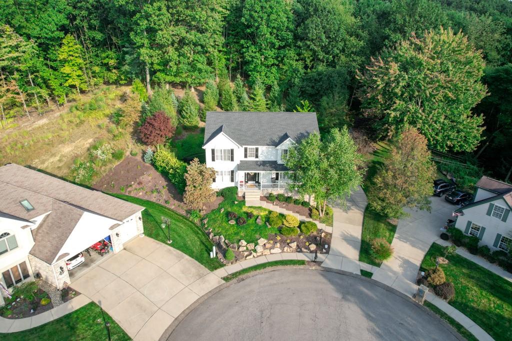 549 Dorchester Drive Seven Fields, PA 16046 - Photo 2 of 35 an aerial view of a house with a garden