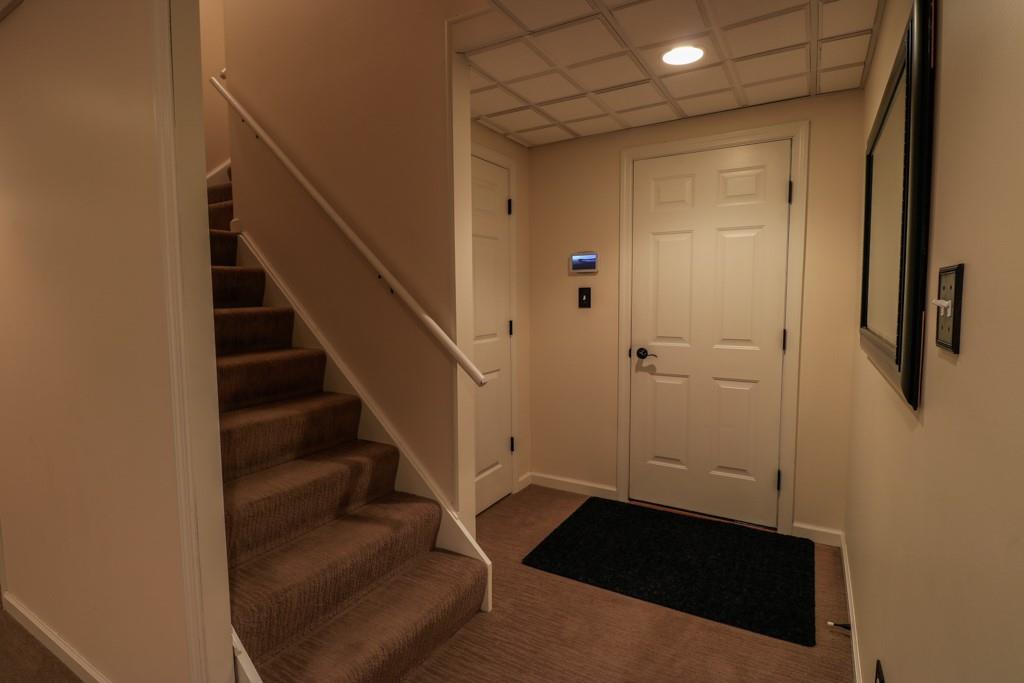549 Dorchester Drive Seven Fields, PA 16046 - Photo 26 of 35 a view of entryway and hall with wooden floor