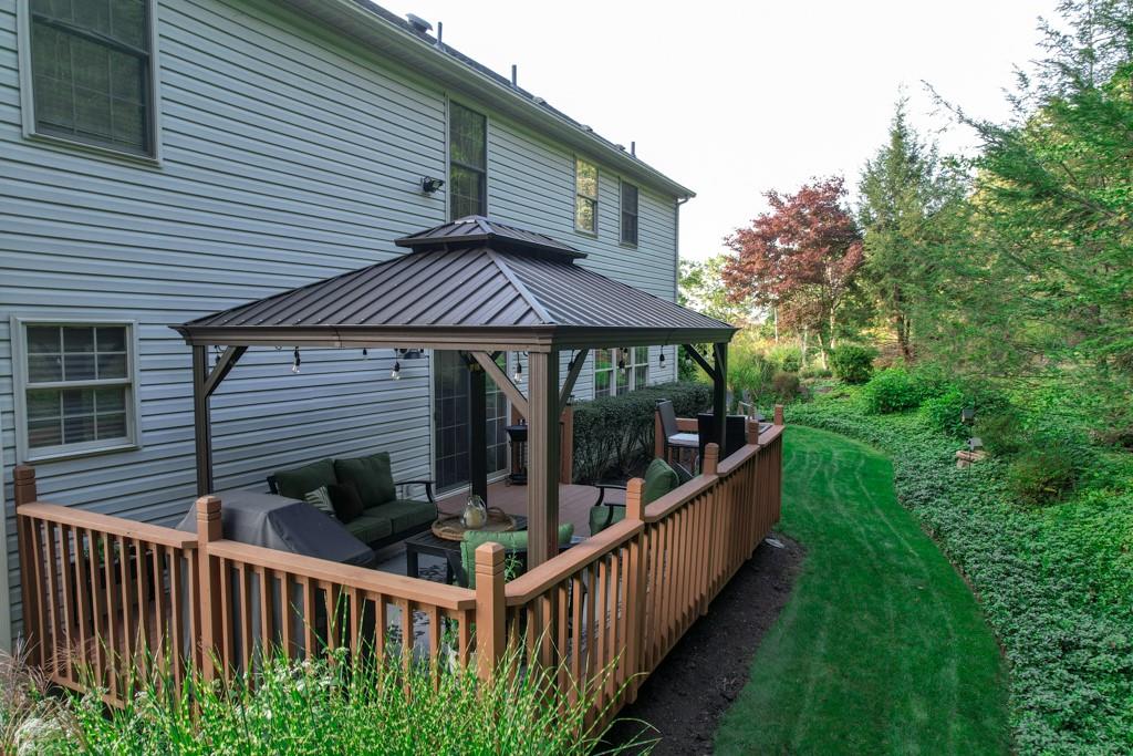 549 Dorchester Drive Seven Fields, PA 16046 - Photo 30 of 35 a view of a house with backyard and porch