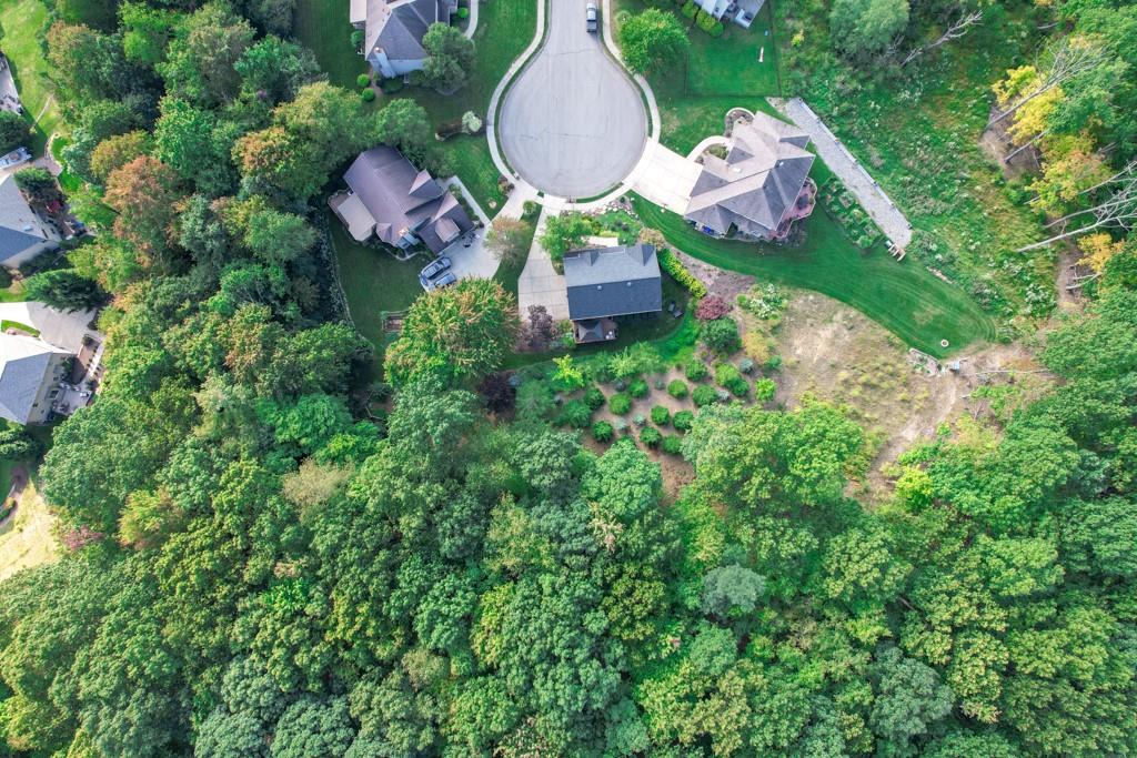549 Dorchester Drive Seven Fields, PA 16046 - Photo 35 of 35 an aerial view of a house with garden space and street view
