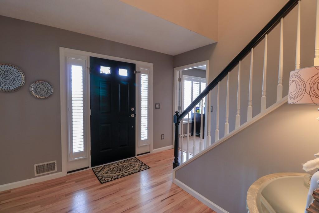 549 Dorchester Drive Seven Fields, PA 16046 - Photo 5 of 35 a view of an entryway with wooden floor