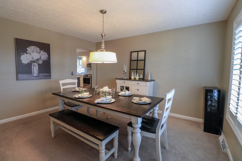 549 Dorchester Drive Seven Fields, PA 16046 - Photo 10 of 35 a view of a dining room with furniture