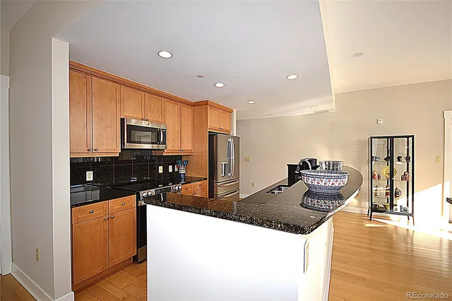 a bedroom with a bed and a view of bathroom