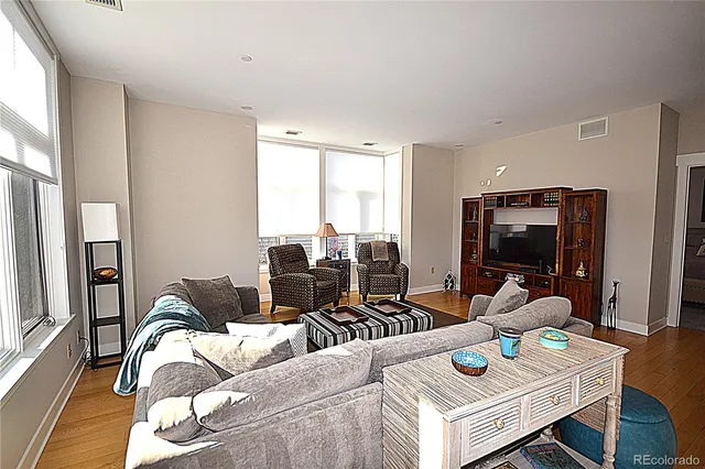 a bathroom with a toilet a sink and a shower