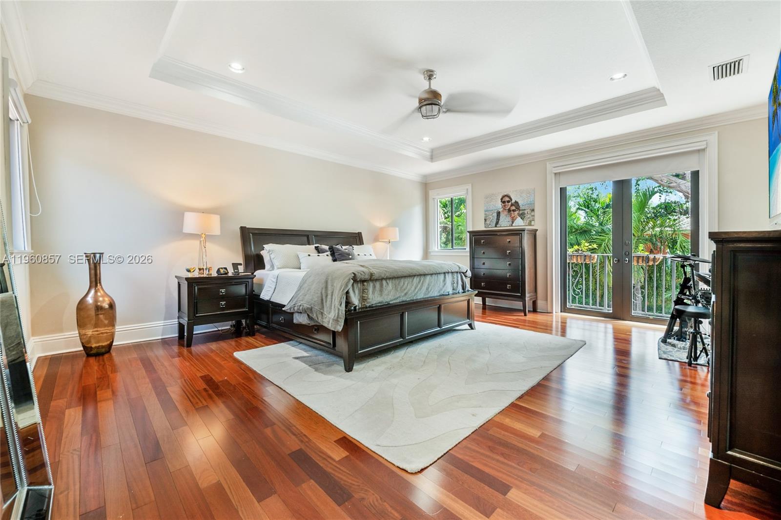 5621 Southwest 68th Court Miami, FL 33143 - Photo 12 of 18 a bedroom with furniture and wooden floor