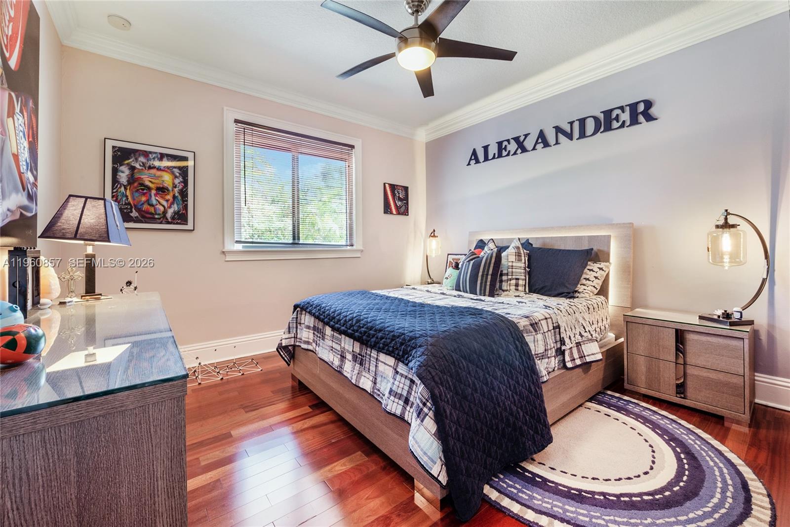 5621 Southwest 68th Court Miami, FL 33143 - Photo 15 of 18 a bedroom with a large bed and a window