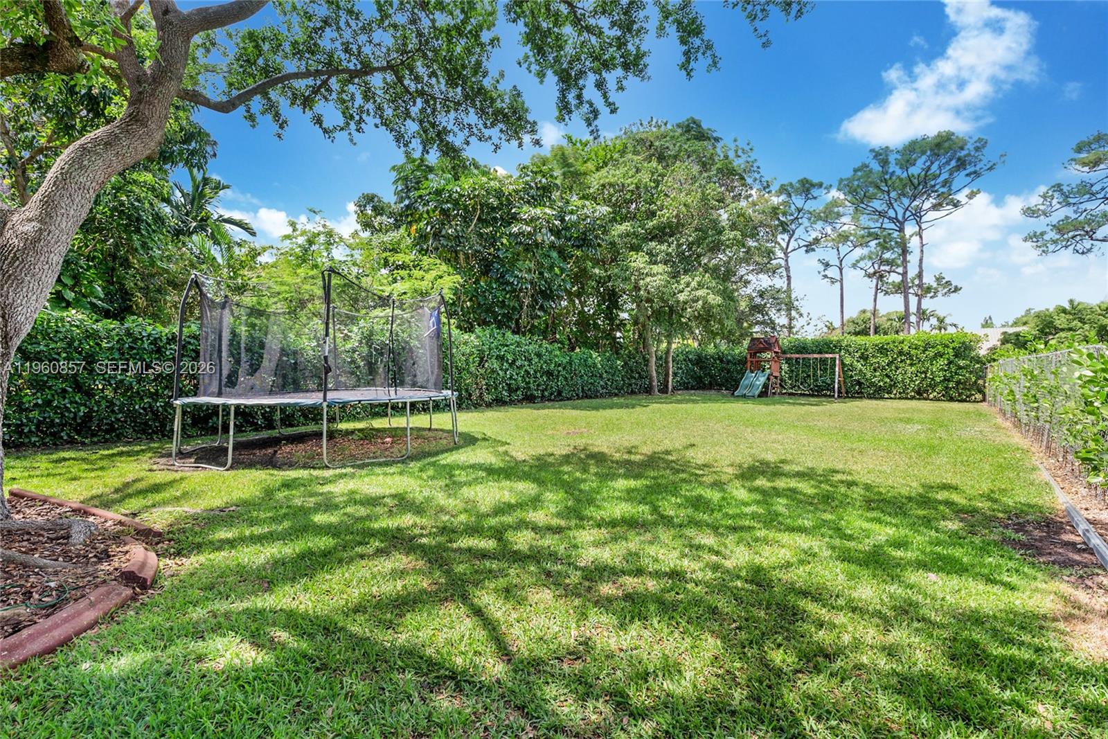 5621 Southwest 68th Court Miami, FL 33143 - Photo 18 of 18 a view of a backyard with swimming pool