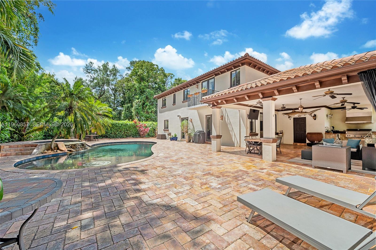 5621 Southwest 68th Court Miami, FL 33143 - Photo 4 of 18 a view of a house with pool and sitting area