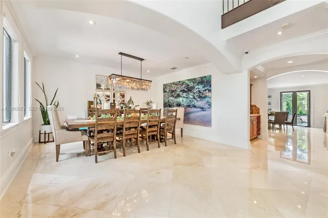 a bedroom with furniture and wooden floor