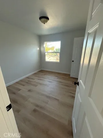 en empty room with windows