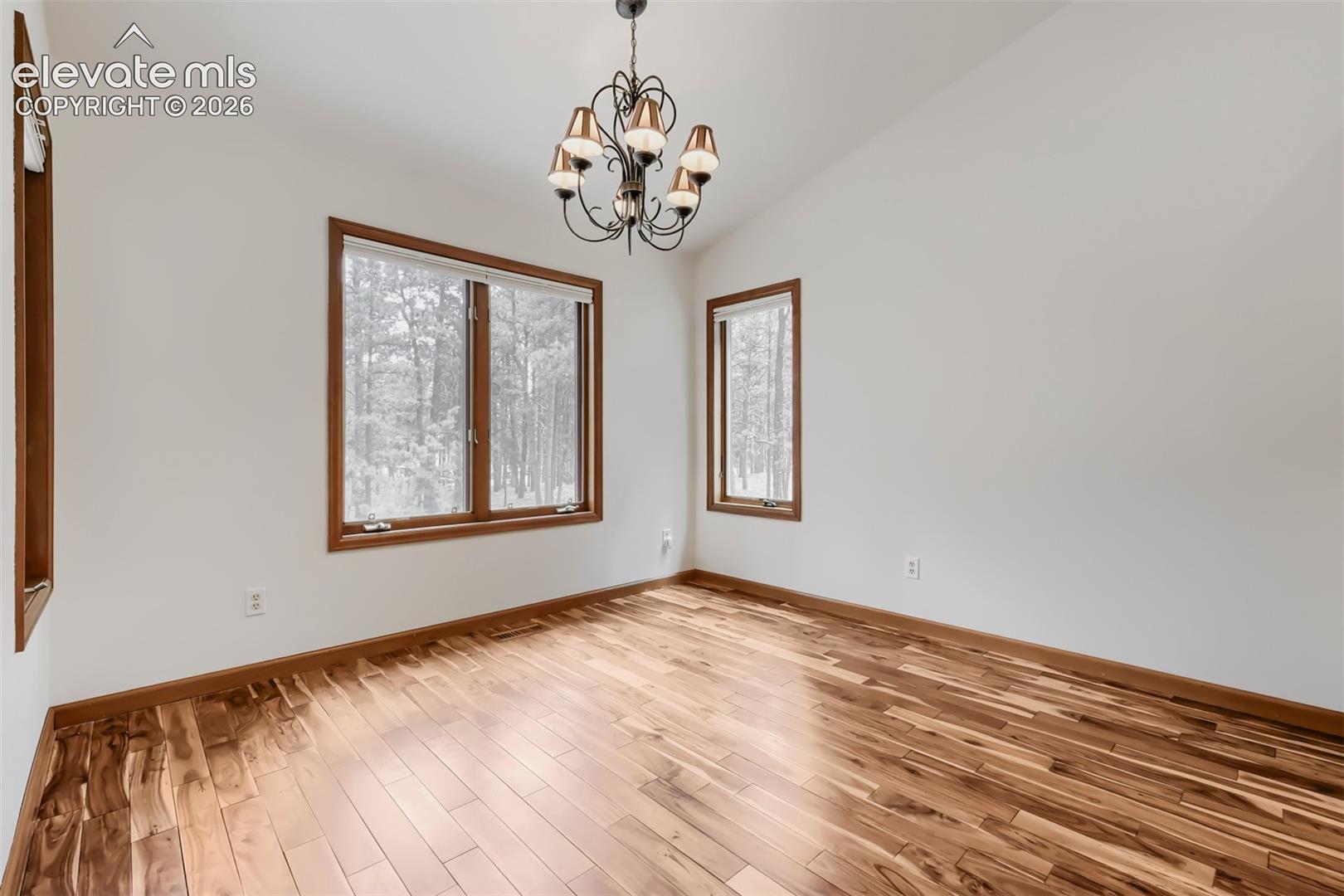 8750 Tannenbaum Road Colorado Springs, CO 80908 - Photo 14 of 50 Dining area off living room and kitchen