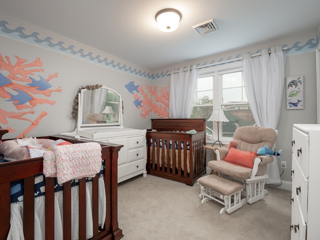 66 Oak Street, Unit 66 Clinton, MA 01510 - Photo 12 of 26 a bedroom with furniture and a window