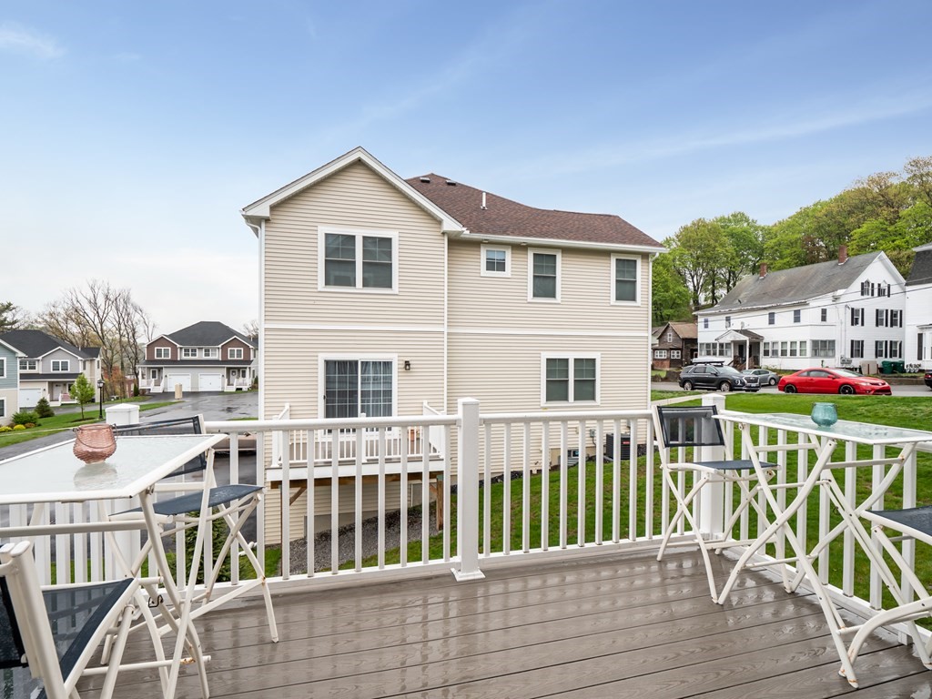 66 Oak Street, Unit 66 Clinton, MA 01510 - Photo 26 of 26 a view of a house with wooden deck