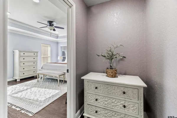 a view of room with a furniture and wooden floor