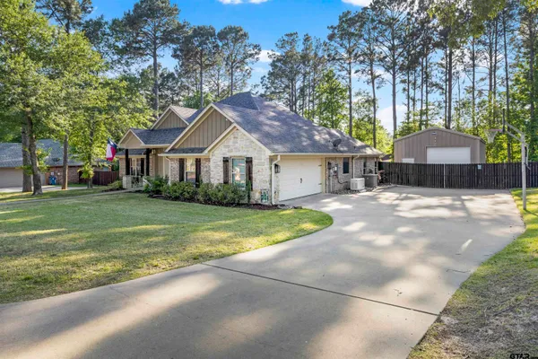 a house with trees in the background
