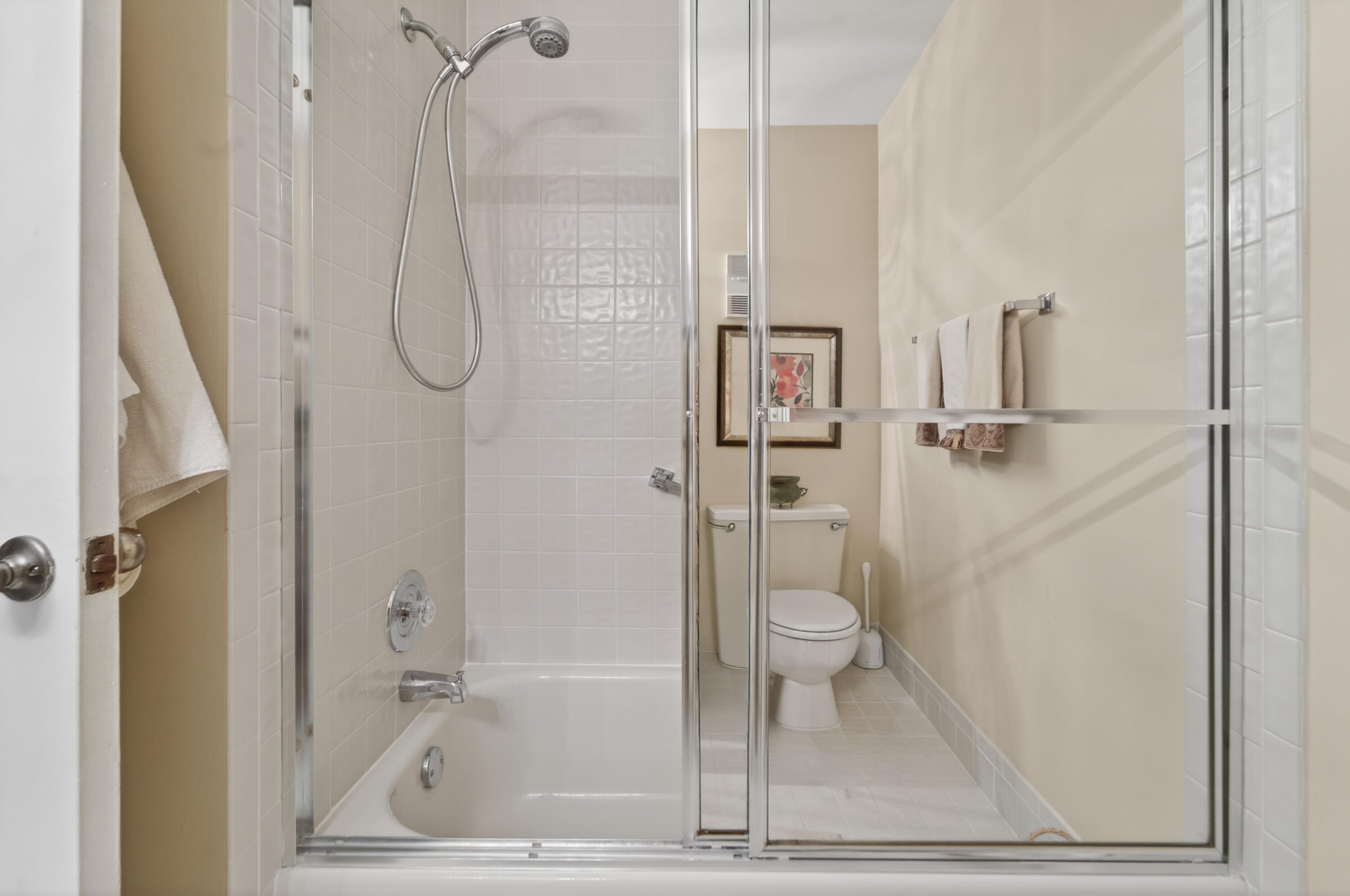 6224 Kings Gate Circle Delray Beach, FL 33484 - Photo 14 of 53 a bathroom with a granite countertop shower and a toilet