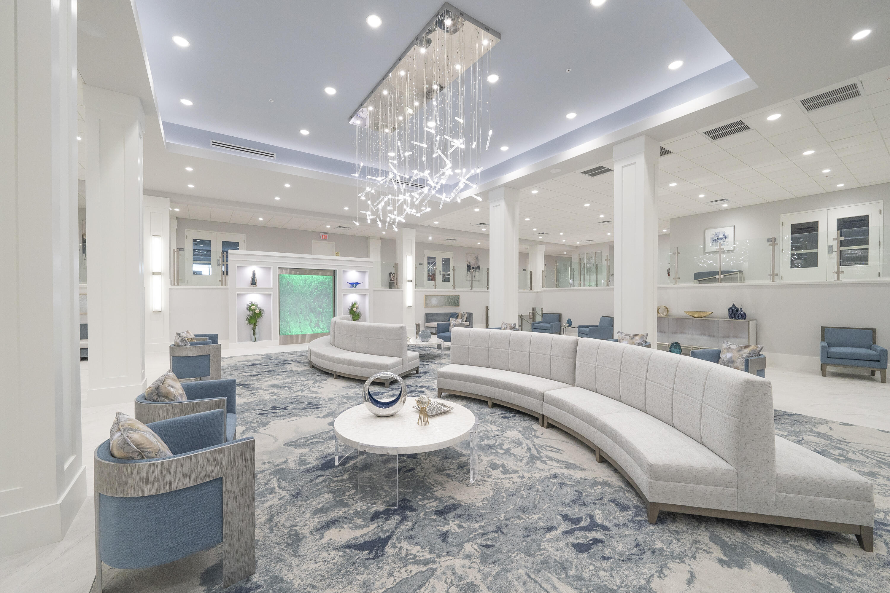 6224 Kings Gate Circle Delray Beach, FL 33484 - Photo 23 of 53 a living room with furniture and a chandelier