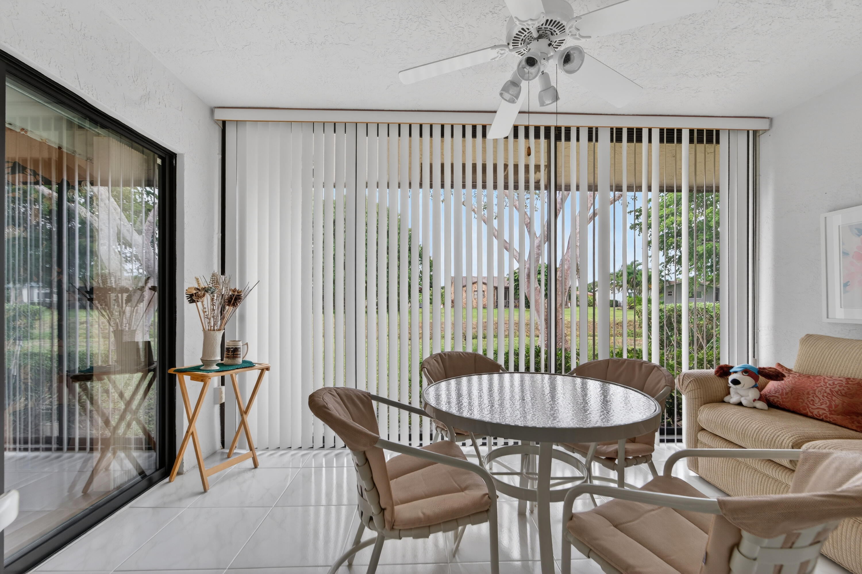 6224 Kings Gate Circle Delray Beach, FL 33484 - Photo 7 of 53 a view of a dining room with furniture window and outside view