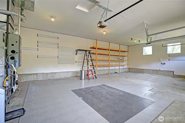 a view of deck with wooden floor and fence next to a yard