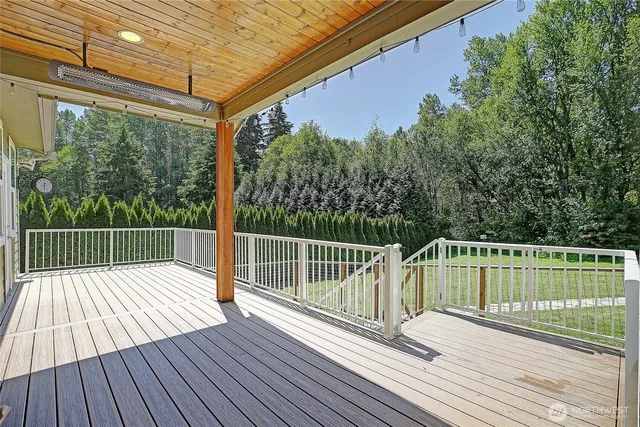 a view of balcony and yard