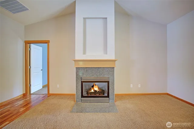 a living room with a fireplace