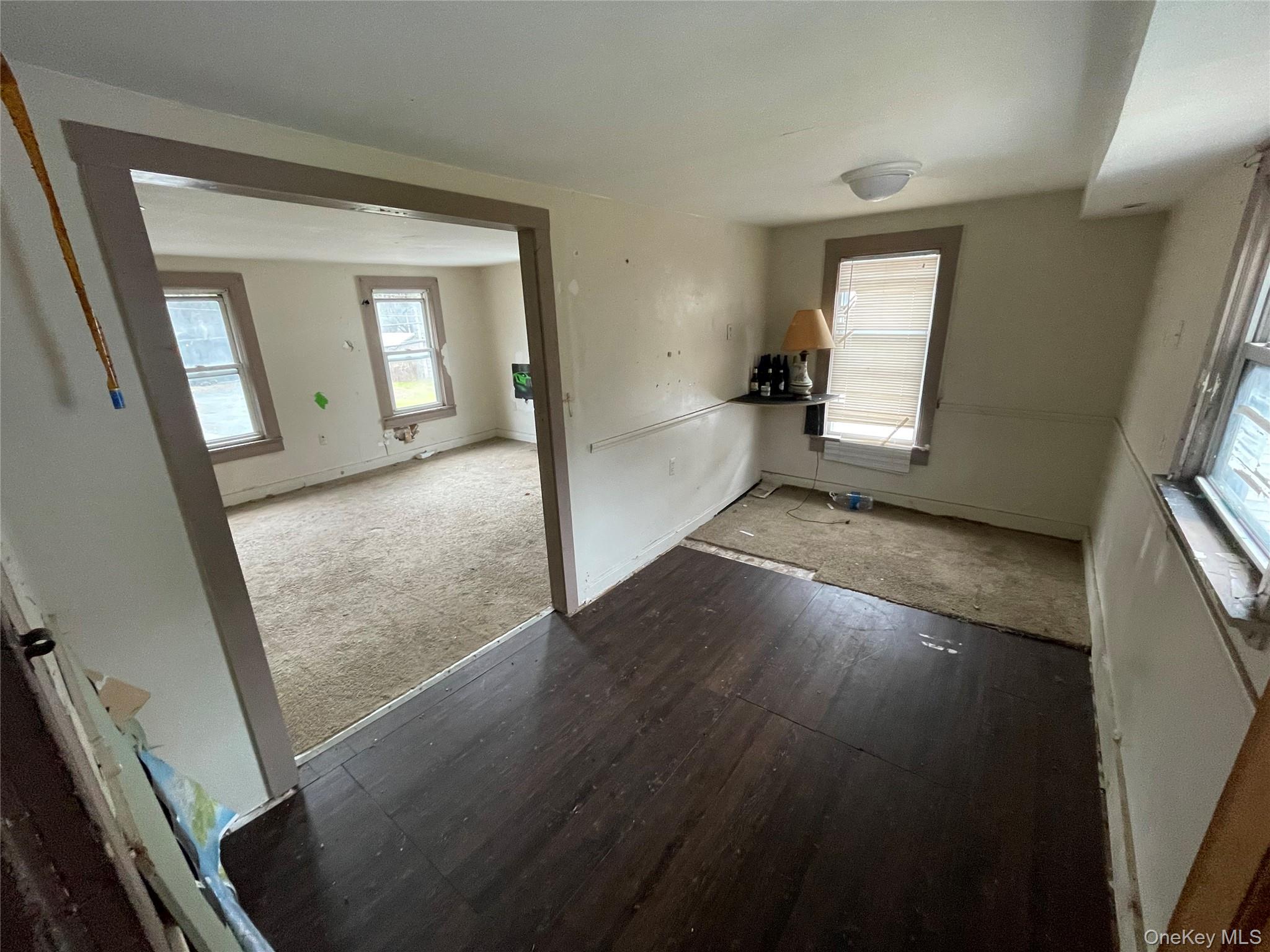 865 North Branch Road Callicoon, NY 12766 - Photo 8 of 15 Spare room with dark carpet and dark wood-type flooring