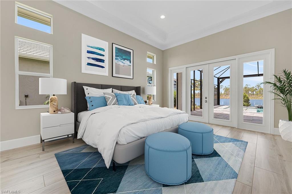 8871 Nevis Way Naples, FL 34112 - Photo 14 of 50 a bedroom with a bed and a couch