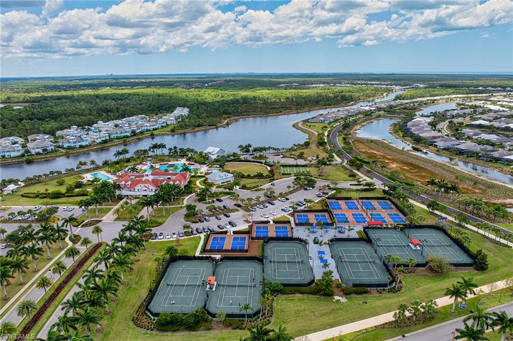 8871 Nevis Way Naples, FL 34112 - Photo 36 of 50 a view of outdoor space with lots of trees