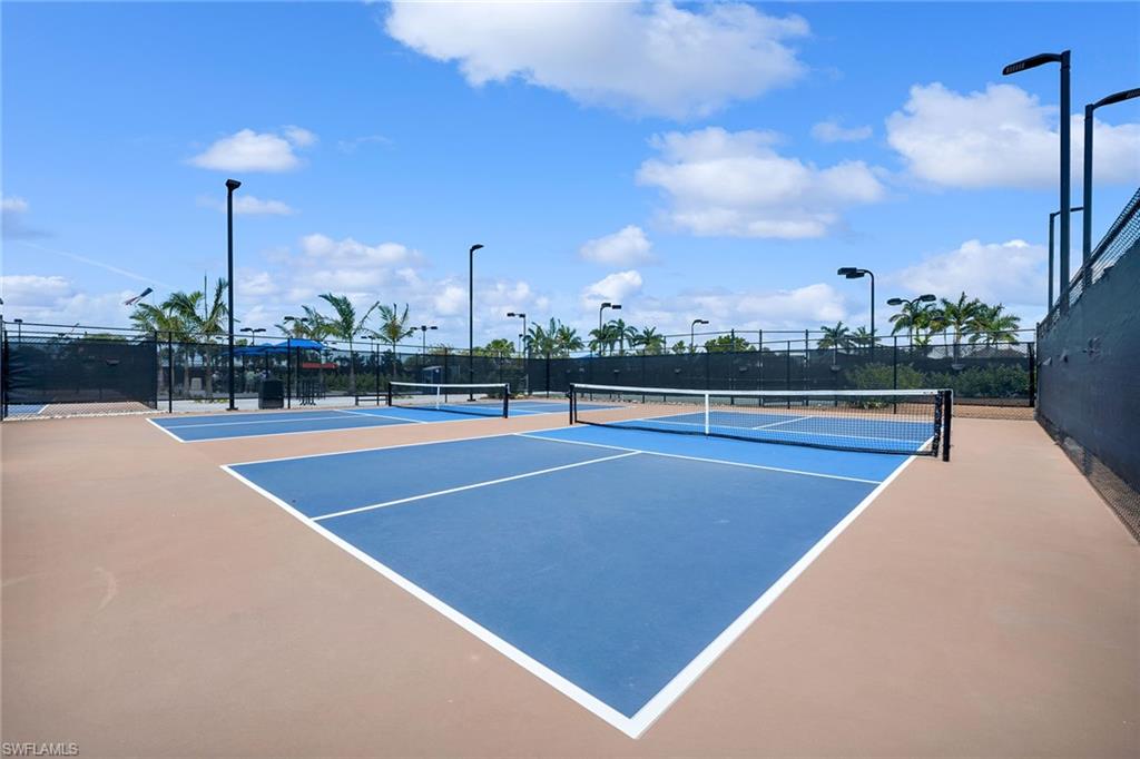 8871 Nevis Way Naples, FL 34112 - Photo 37 of 50 a view of a tennis court