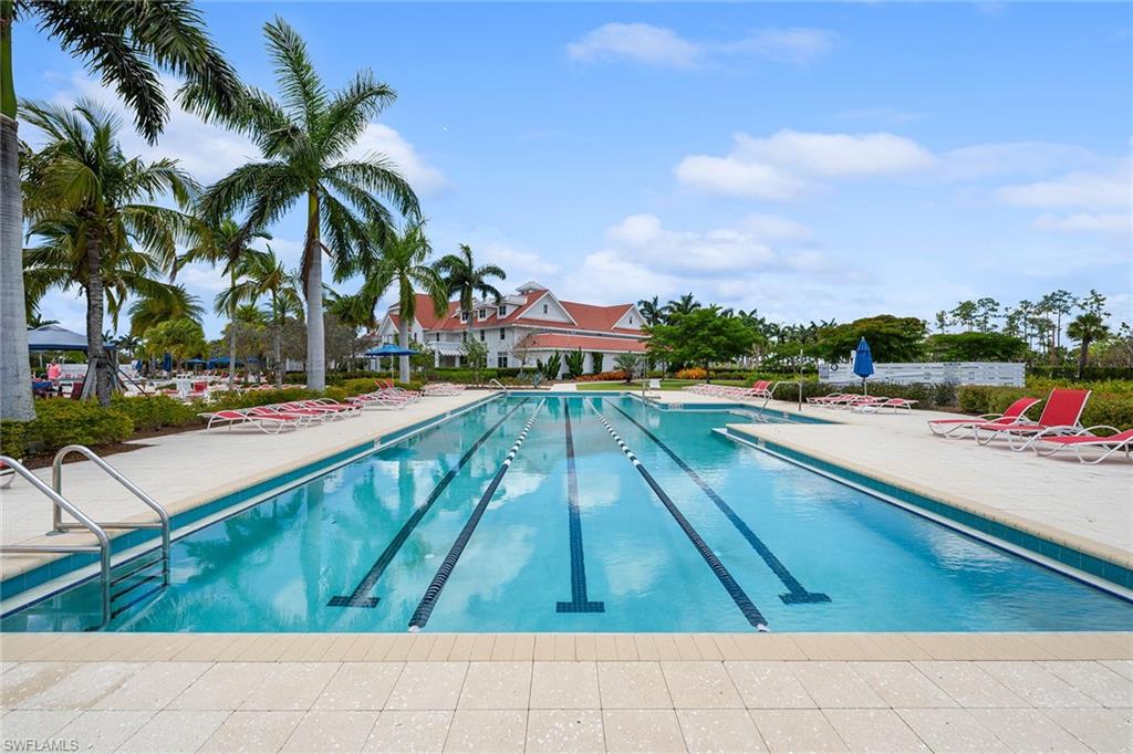 8871 Nevis Way Naples, FL 34112 - Photo 47 of 50 a view of swimming pool with chairs