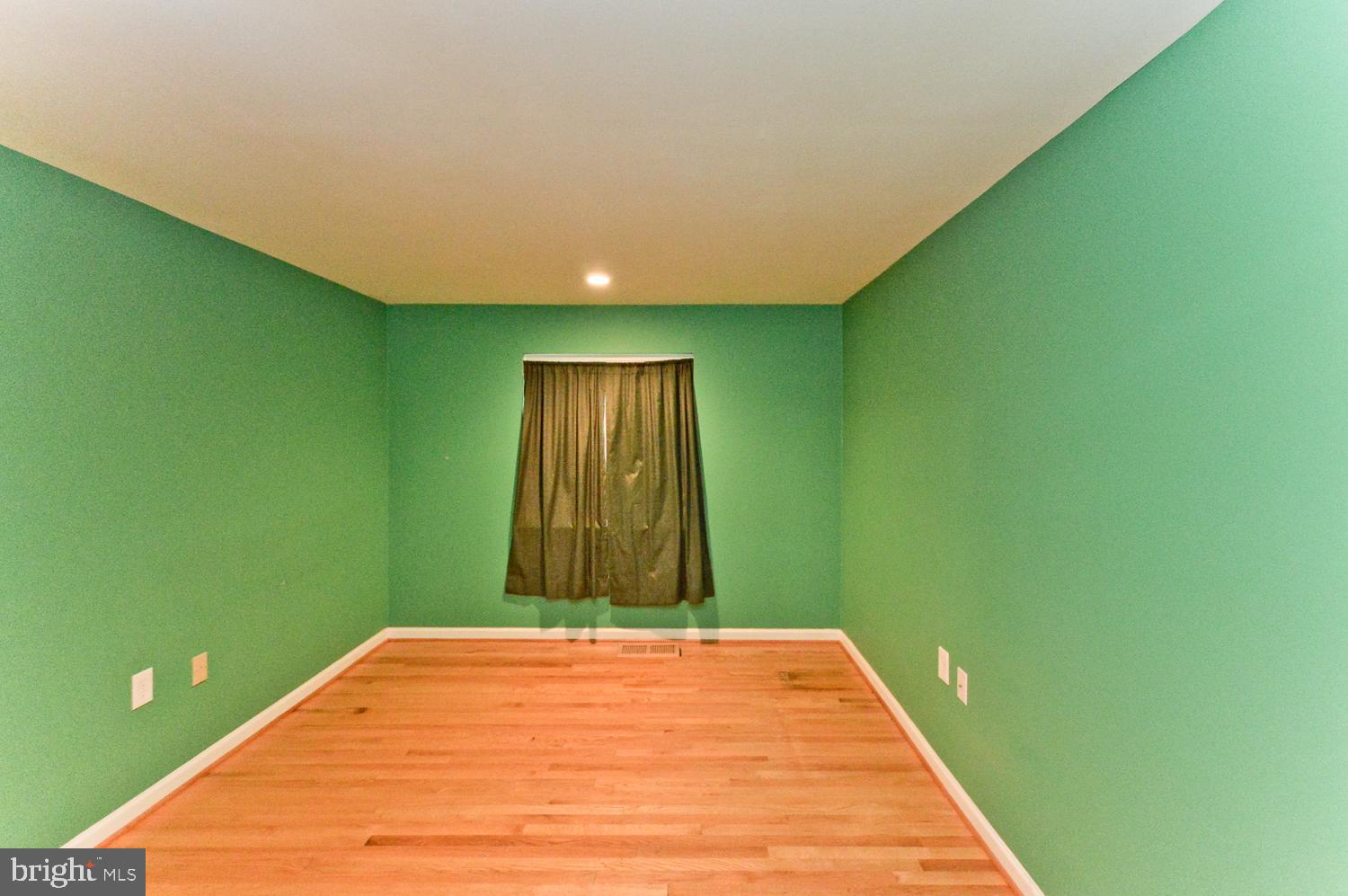 9607 Horizon Run Road, Unit 3D Montgomery Village, MD 20886 - Photo 26 of 30 Generous Size Bedroom with wood floors