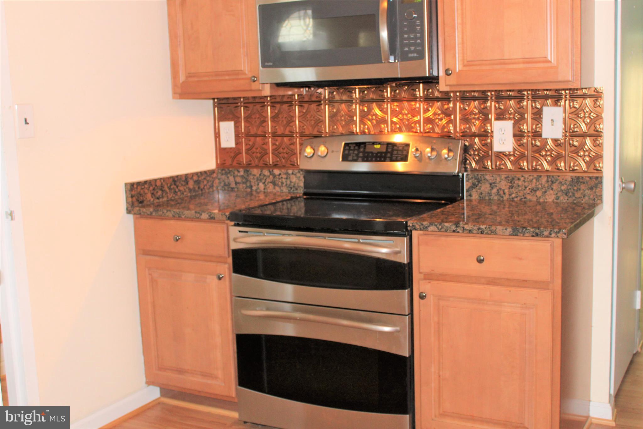 9607 Horizon Run Road, Unit 3D Montgomery Village, MD 20886 - Photo 6 of 30 SS appliances and granite counters